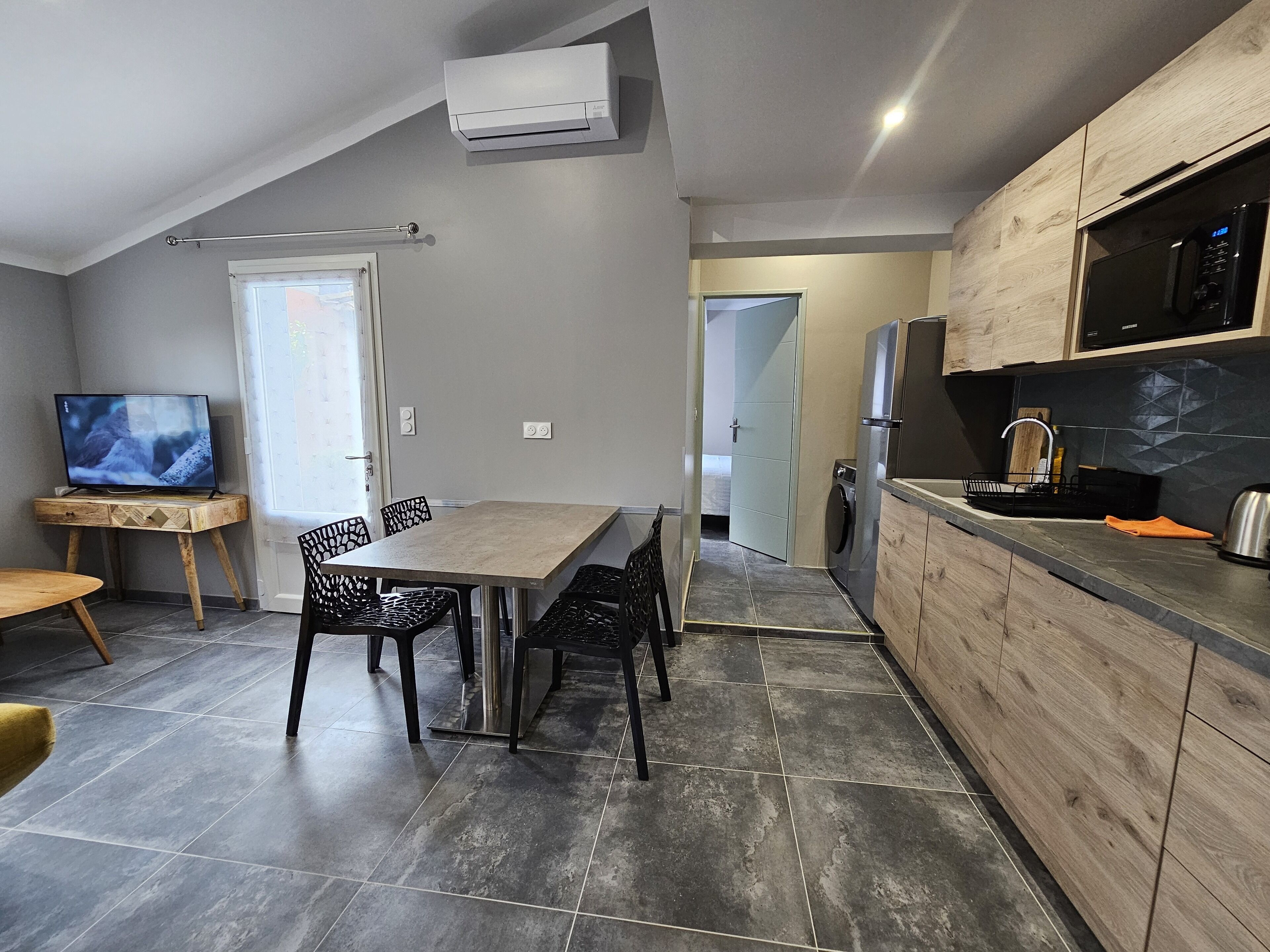 Family Apartment, Multiple Beds | Private kitchen | Shared fridge, coffee/tea maker, electric kettle, highchair