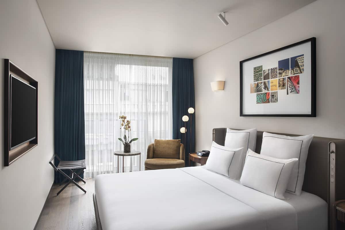 Habitación estándar | Ropa de cama de alta calidad y minibar
