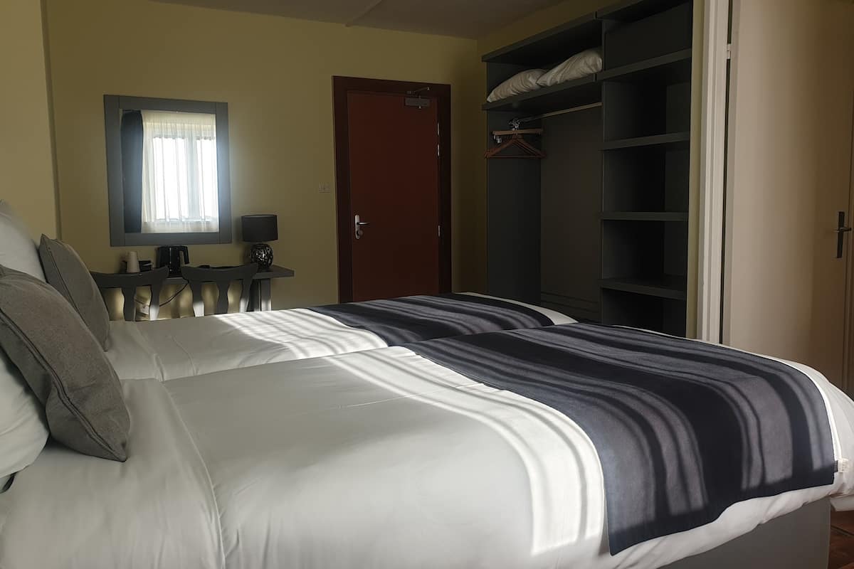 Comfort Twin Room | 1 bedroom, premium bedding, blackout curtains, iron/ironing board