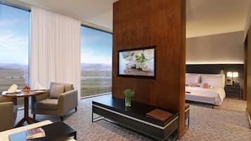 Suite, 1 King-Bett | Wohnbereich | LED-Fernseher