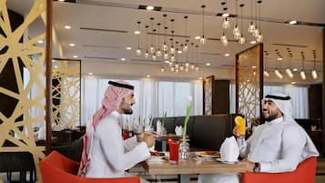 Breakfast, lunch, dinner served; international cuisine