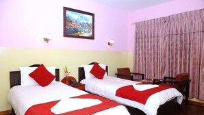 A hotel room with two beds, each with red and white bedding, a painting on the wall, and a large window with curtains. - Asian Himalaya Home Stay (Kathmandu)