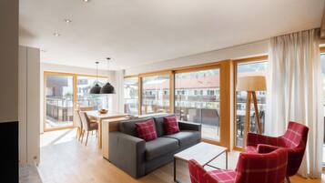 Superior chalet | Woonruimte | Flatscreentelevisie