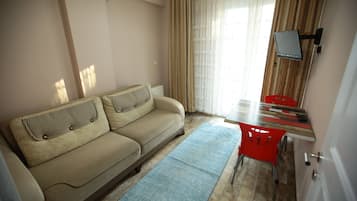 Comfort Apartment, 1 Bedroom, Kitchen, City View | Living room | LCD TV, heated floors