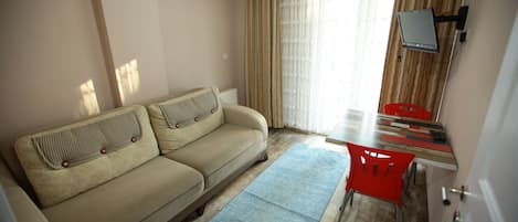 Comfort Apartment, 1 Bedroom, Kitchen, City View | Living room | LCD TV, heated floors