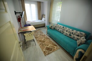 Comfort Apartment, 1 Bedroom, Kitchen, City View | Living room | 55-cm LCD TV with satellite channels, TV, heated floors
