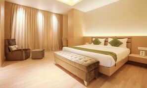 Premium Room | Desk, iron/ironing board, rollaway beds, free WiFi - Treebo Tryst Grand Bhabendra Alay (Guwahati)