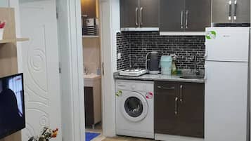 Deluxe Apartment, 1 Bedroom | Living area | LCD TV