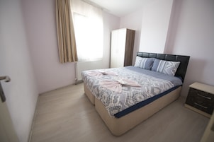 Premium bedding, down comforters, individually decorated