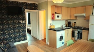 Second Floor Apartment | Private kitchen | Fridge, oven, electric kettle, toaster