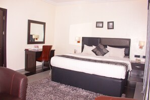 Luxury Room | Premium bedding, desk, laptop workspace, free WiFi