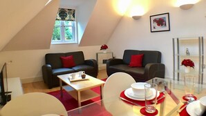Apartment, 2 Bedrooms | Living area | Flat-screen TV