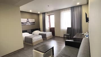 Ropa de cama de alta calidad y minibar
