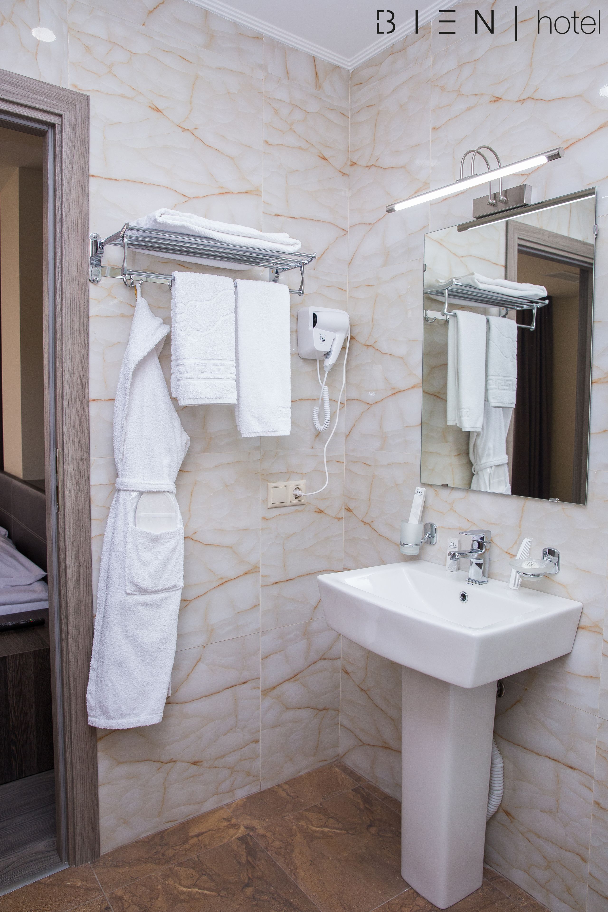 economy double room | bathroom | shower, free toiletries, hair dryer, bathrobes