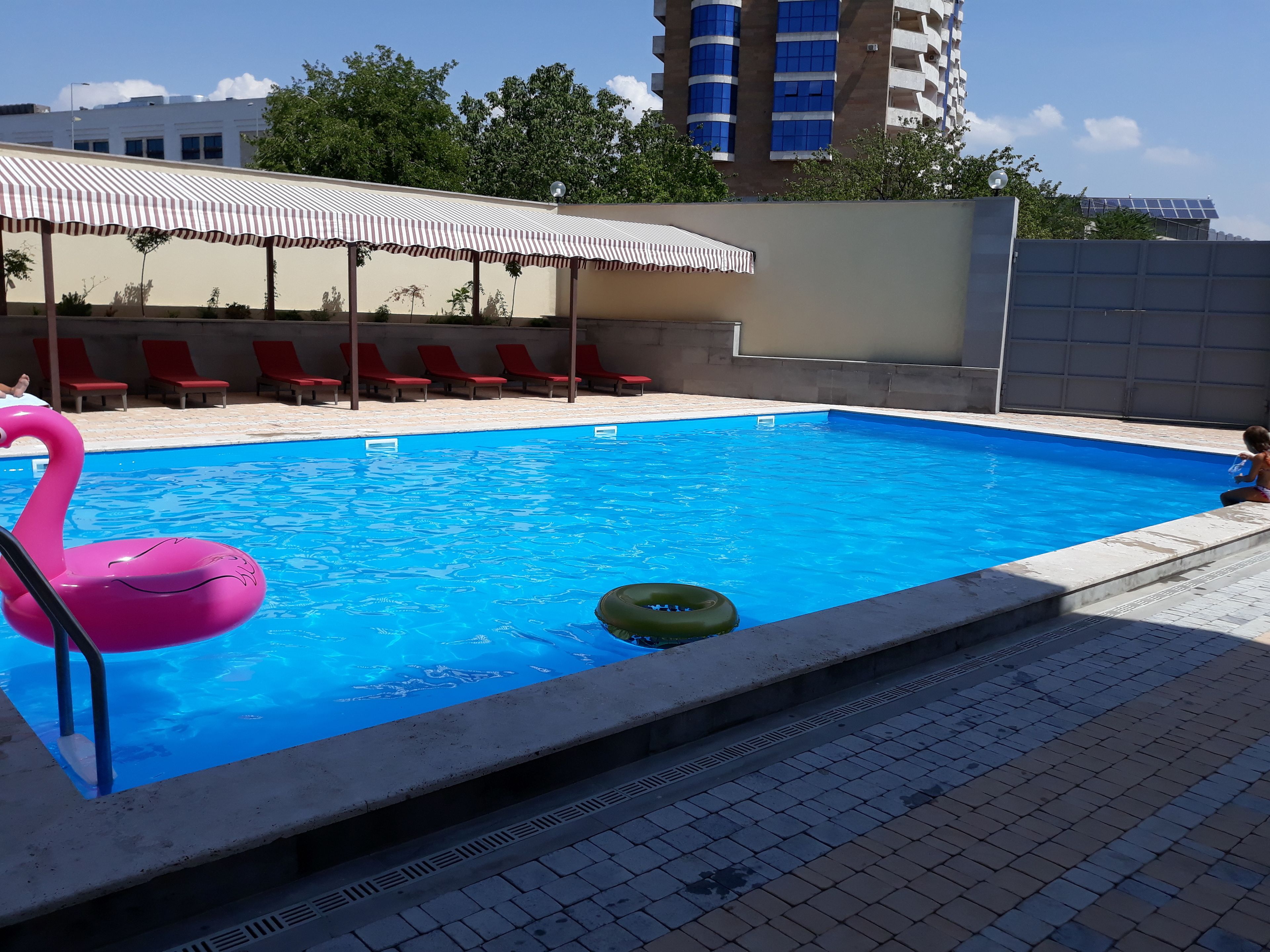 seasonal outdoor pool, free pool cabanas, pool umbrellas