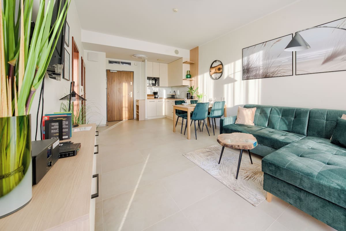 Appartement (B207) | Aire de séjour | Téléviseur à écran plat