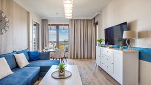 Apartment B 605 Sea View | Living area | Flat-screen TV - Sun & Snow - Olympic Park (Kolobrzeg)