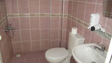 Shower, free toiletries, hair dryer, slippers