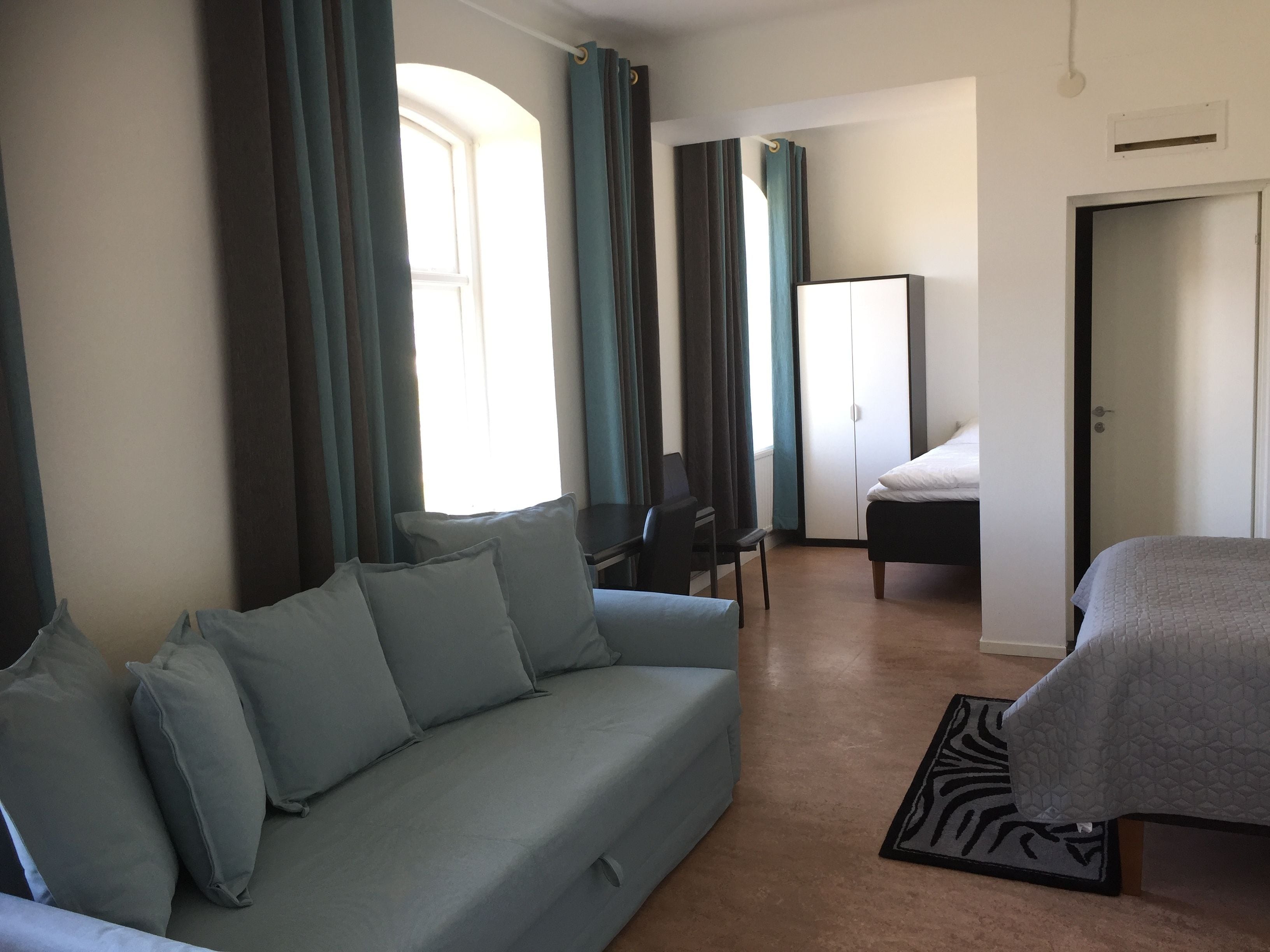 Family Suite, Private Bathroom, Lake View | Desk, rollaway beds, free WiFi, bed sheets