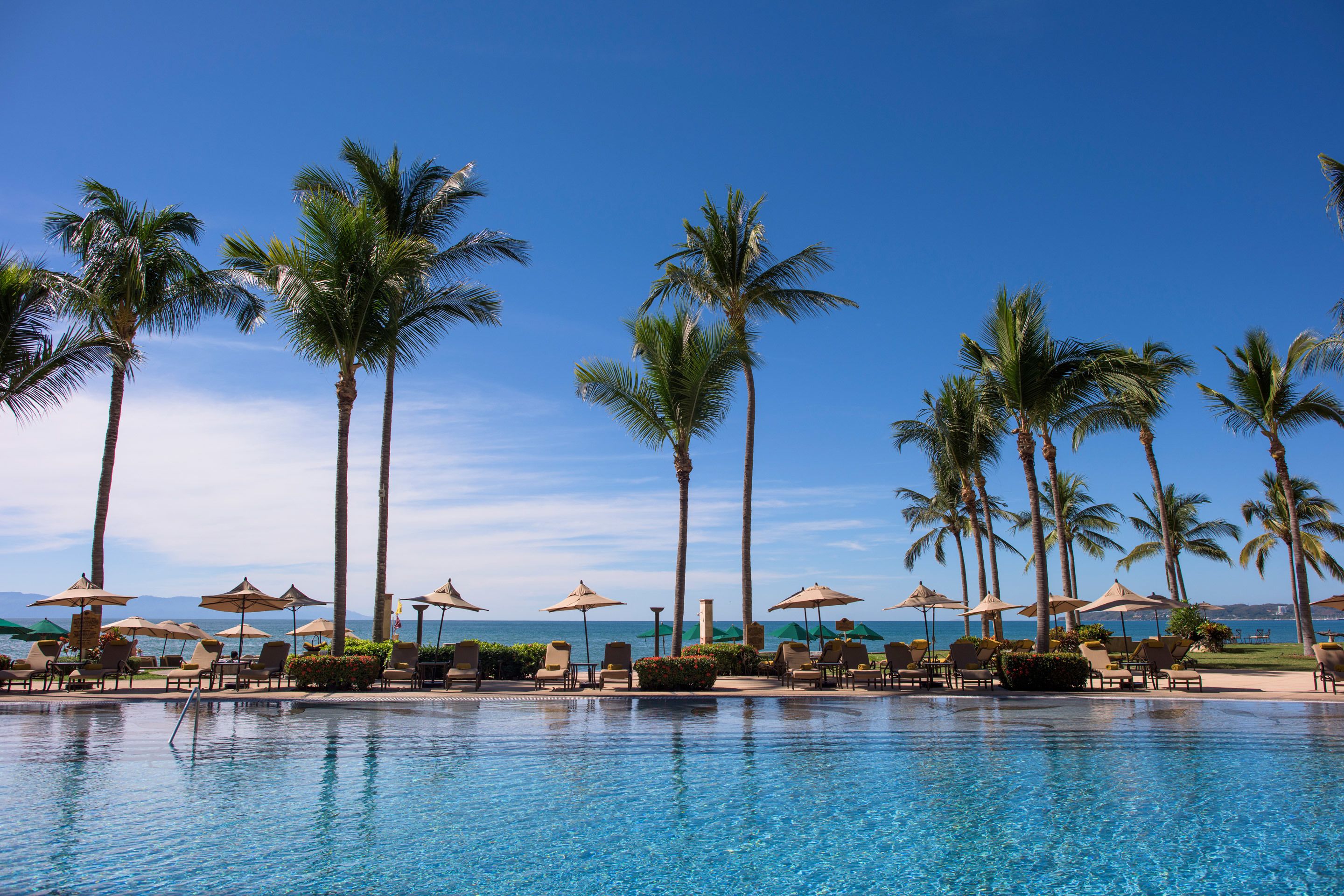 2 outdoor pools, pool umbrellas, pool loungers