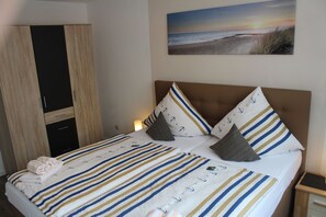 Hypo-allergenic bedding, iron/ironing board, free cots/infant beds