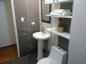 Apartment, 3 Bedrooms | Bathroom | Shower, free toiletries, hair dryer, towels