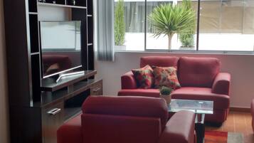 Apartment, 3 Bedrooms | Living room | Flat-screen TV, Netflix