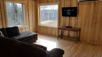 Panoramic Chalet, Multiple Beds, River View, Overwater | Living room | Flat-screen TV