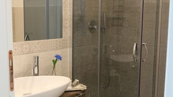 Superior Double Room, City View | Bathroom | Shower, rainfall showerhead, free toiletries, hair dryer