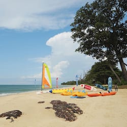 On the beach, sun-loungers, beach umbrellas, beach volleyball