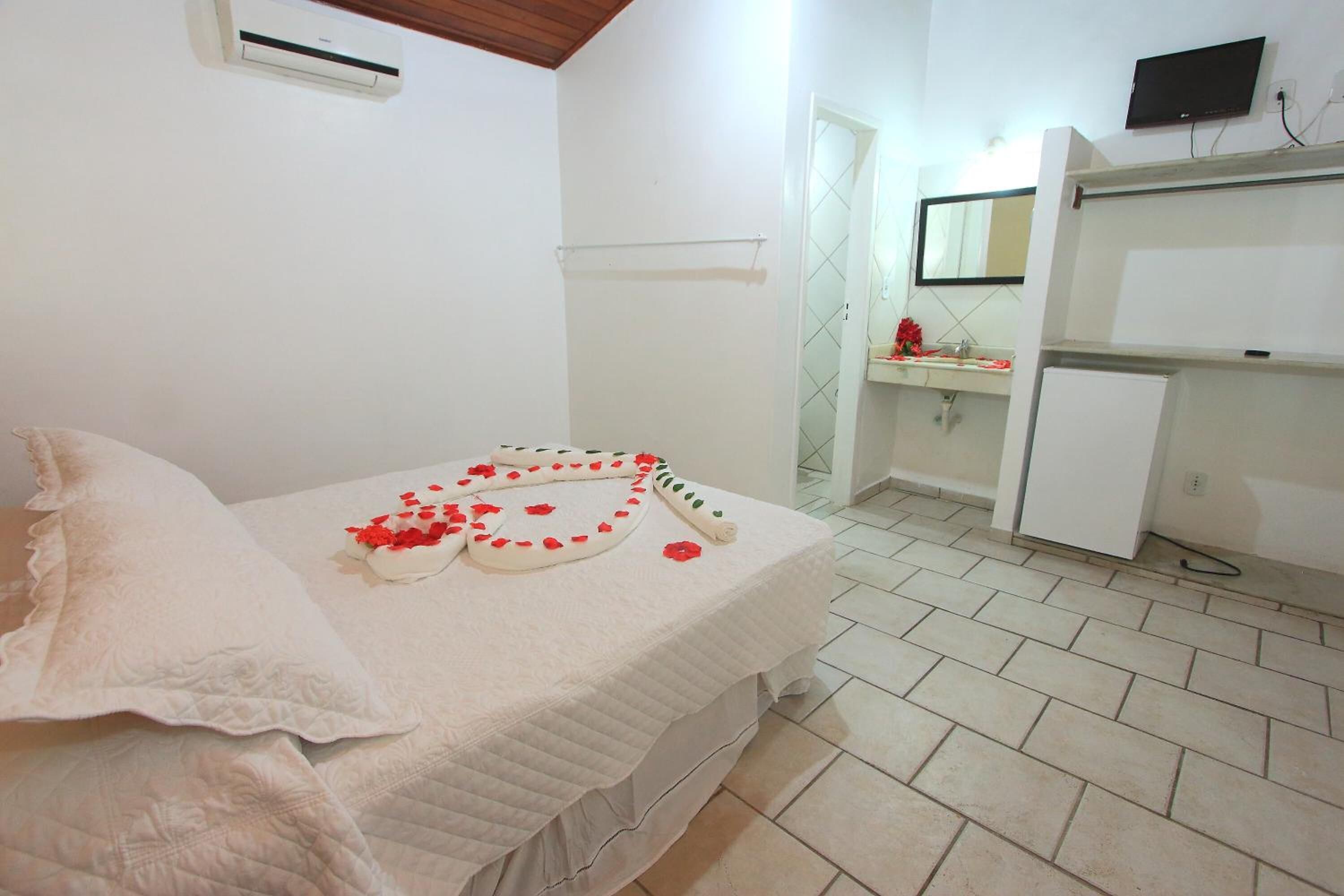 Minibar, in-room safe, blackout curtains, bed sheets