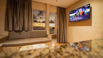 Habitación | Tabla de planchar con plancha, wifi gratis, ropa de cama