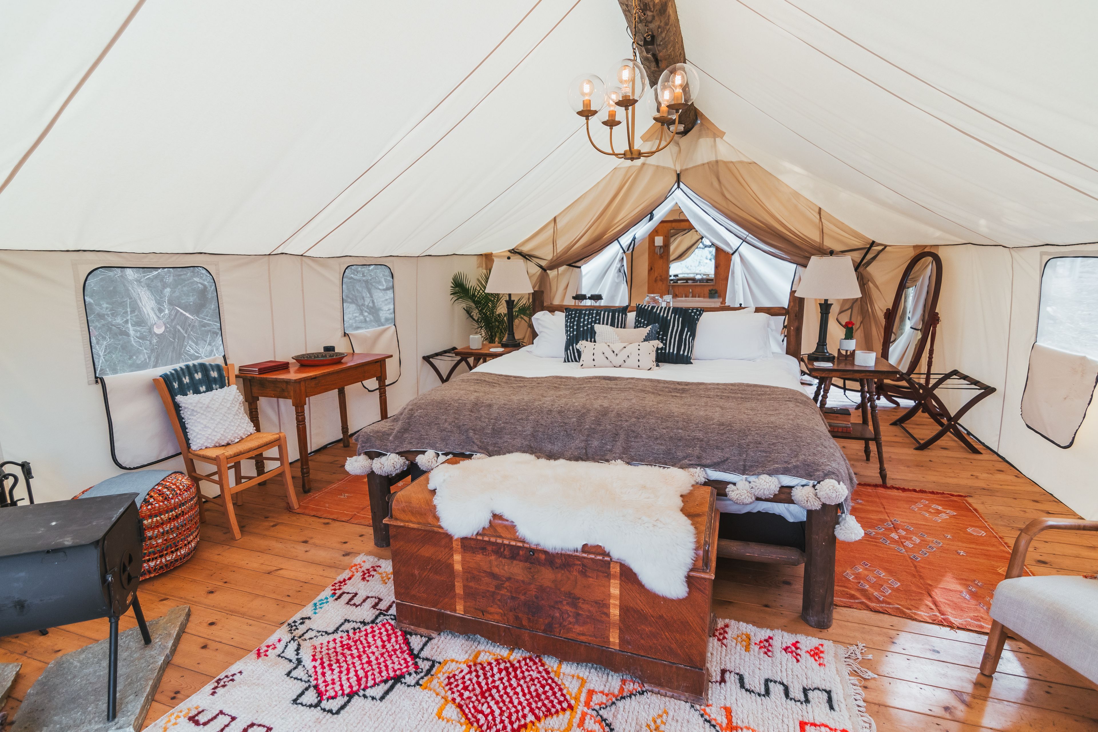 luxury tent, 1 king bed | living area | fireplace