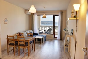 Panoramic Apartment, 2 Bedrooms, Sea View | Living area | Flat-screen TV - Waterfront Sea Star 2 bedroom Apartment (Varna)