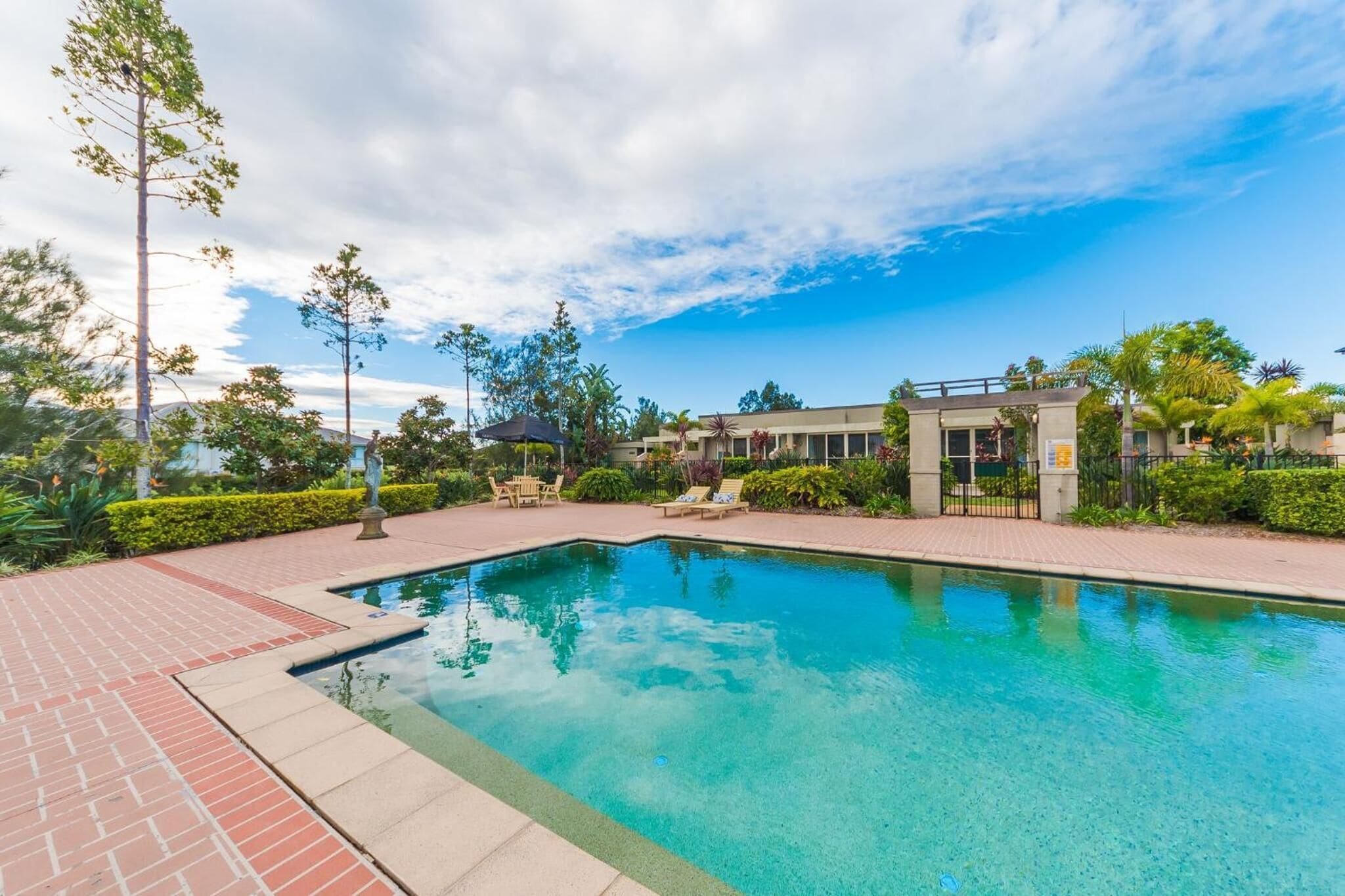 outdoor pool, open 8 am to 8 pm, pool loungers