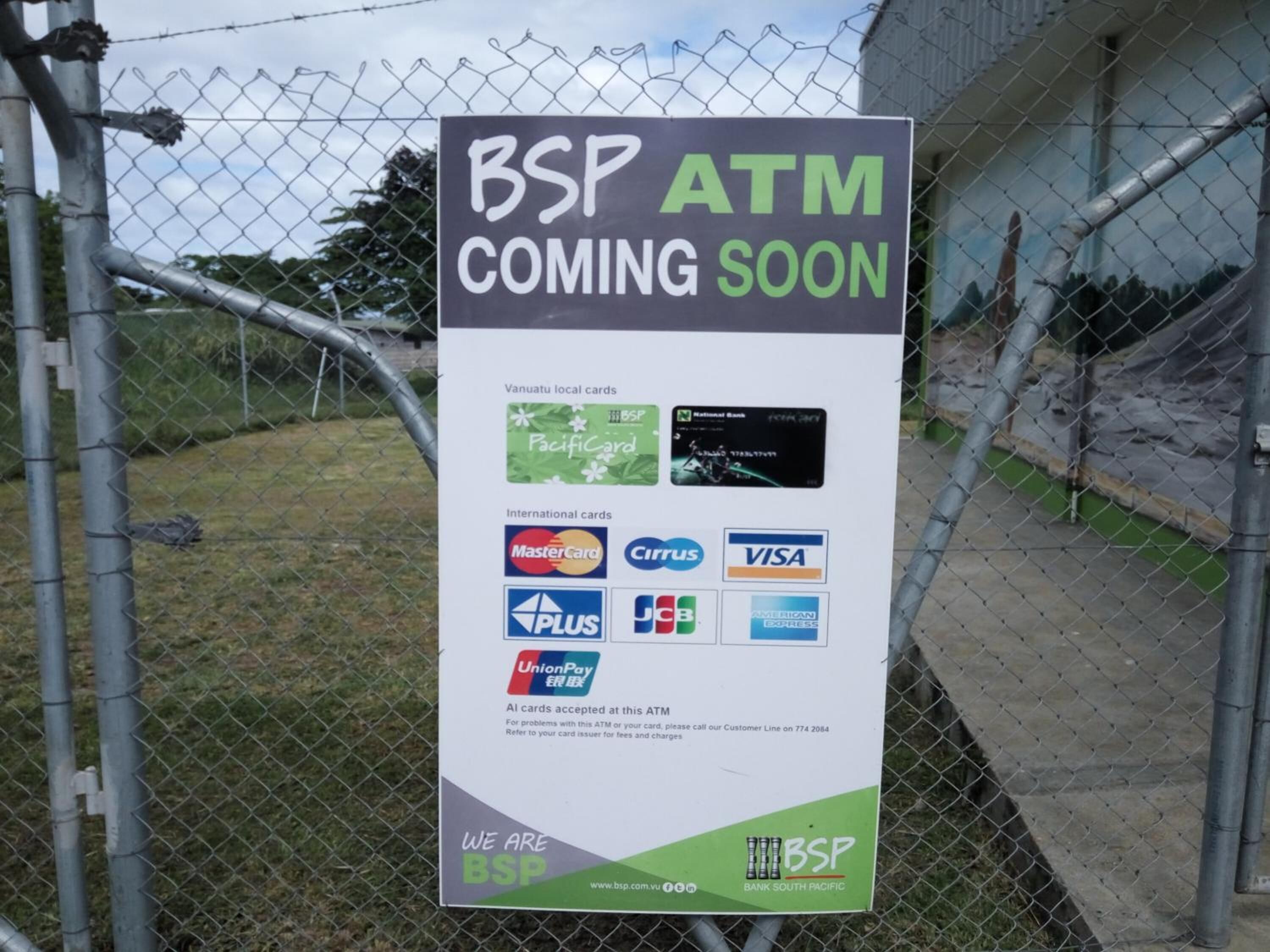 A sign for an upcoming BSP ATM, listing accepted local and international cards.