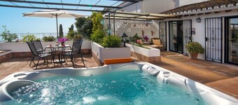 Beautiful village house in the heart of Mijas Pueblo with magnificent sea views.