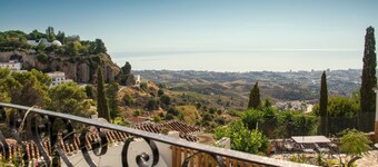 Beautiful village house in the heart of Mijas Pueblo with magnificent sea views.