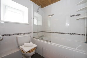 Ducha y bañera combinadas y toallas