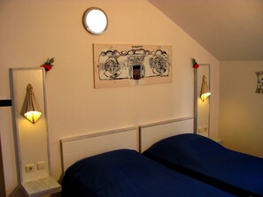 1 habitación, acceso a internet y ropa de cama