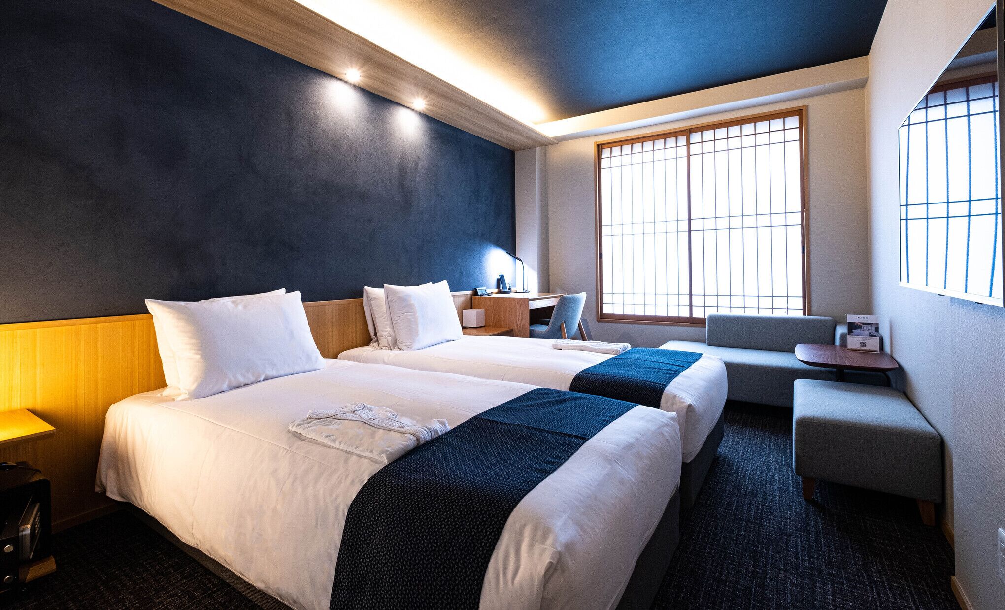 Premium bedding, down comforters, in-room safe, desk