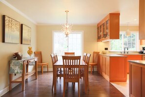 Enjoy cooking in this well-equipped kitchen with a central island and ample counter space.