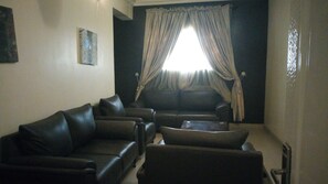 Penthouse | Living room | Flat-screen TV