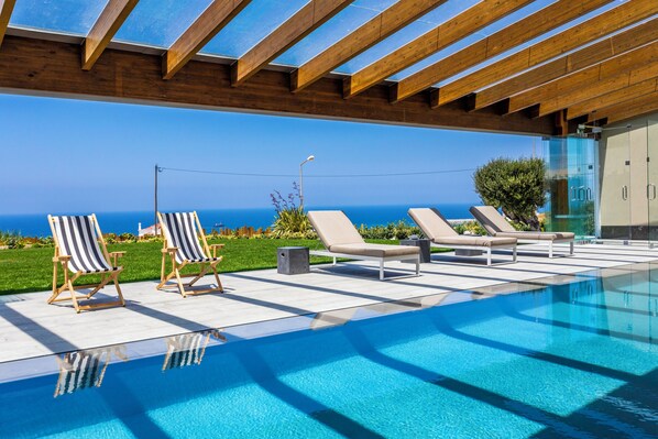Indoor pool, outdoor pool, pool umbrellas, sun loungers