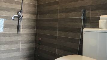 Shower, free toiletries, hair dryer, slippers