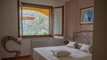 Apartment, 1 Bedroom, Balcony | 1 bedroom, premium bedding, iron/ironing board, cribs/infant beds