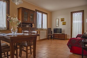 Apartment, 1 Bedroom, Sea View | Living area | Flat-screen TV