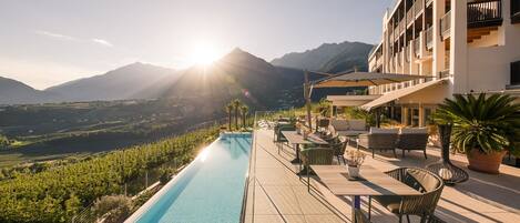 Indoor pool, outdoor pool, pool umbrellas, sun loungers