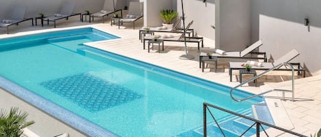 Indoor pool, outdoor pool, open 8:00 AM to 8:00 PM, pool umbrellas