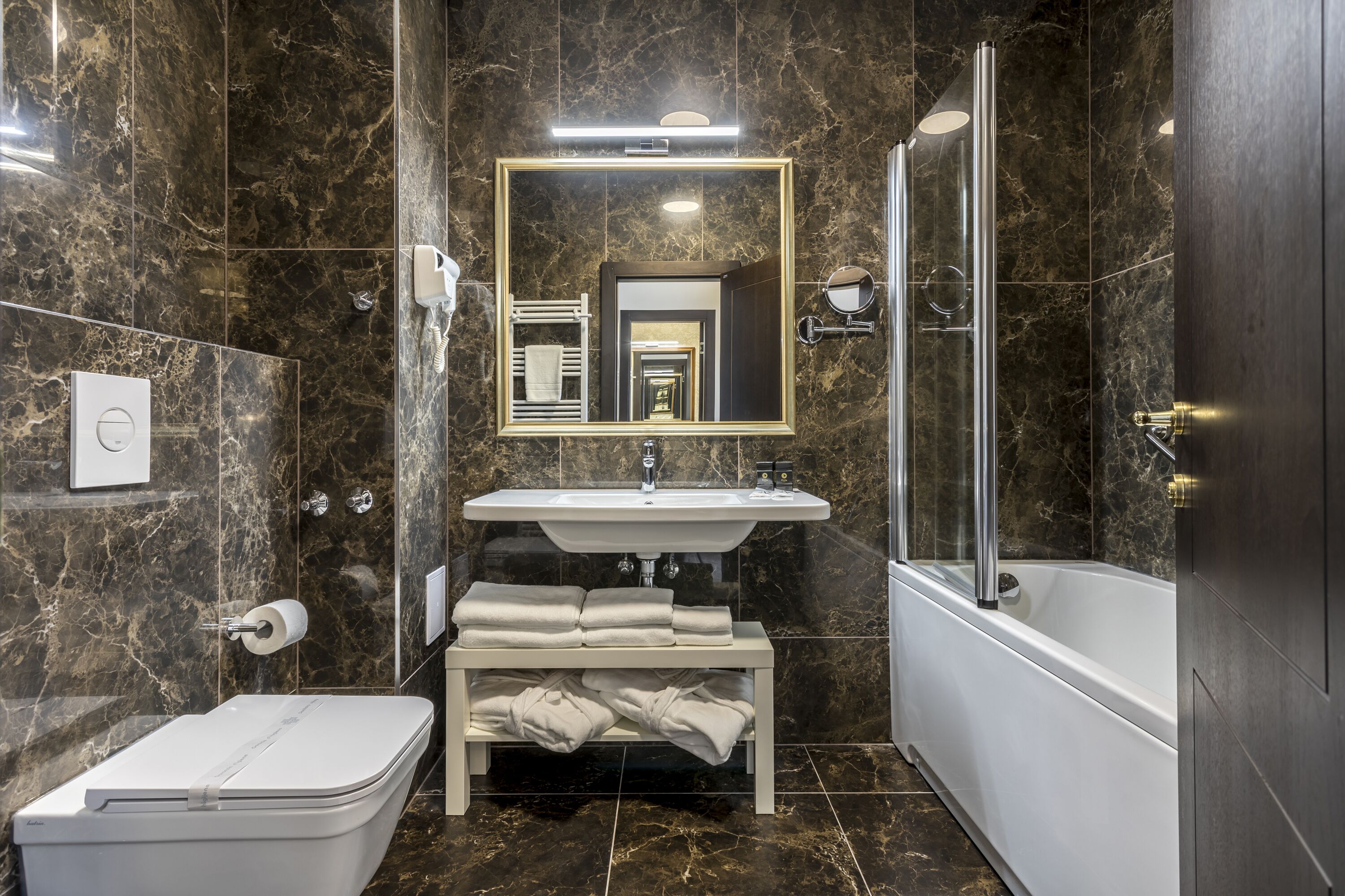 shower, designer toiletries, hair dryer, bathrobes